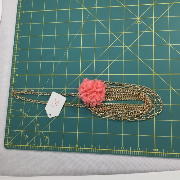 Multi chain bib necklace with fabric flower - Picture 2 of 3